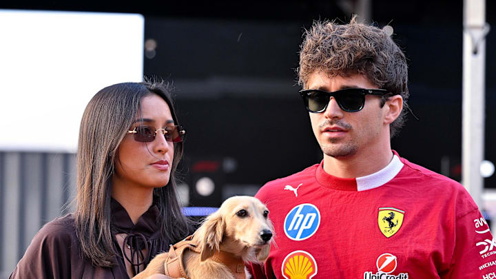 Scuderia Ferrari driver Charles Leclerc (16) of Team Monaco arrives at the track with his girlfriend Alexandra Saint Mleux before practice for the US Grand Prix at Circuit of The Americas Austin. 