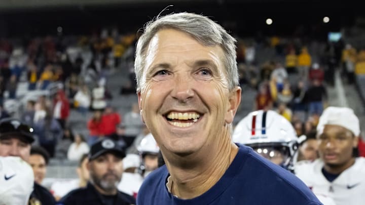 Nov 28, 2025; Tempe, Arizona, USA; Arizona Wildcats head coach Brent Brennan celebrates against the Arizona State Sun Devils during the 99th Territorial Cup at Mountain America Stadium. Mandatory Credit: Mark J. Rebilas-Imagn Images Nov 28, 2025; Tempe, Arizona, USA; Arizona Wildcats head coach Brent Brennan celebrates against the Arizona State Sun Devils during the 99th Territorial Cup at Mountain America Stadium. Mandatory Credit: Mark J. Rebilas-Imagn Images
