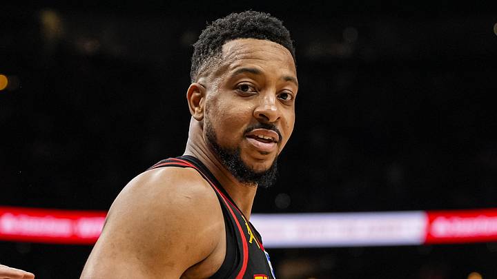 Atlanta Hawks guard CJ McCollum (3) reacts after making a shot from beyond half court against the New York Knicks during the second half at State Farm Arena on April 6, 2026.