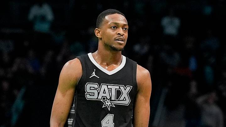 Feb 7, 2025; Charlotte, North Carolina, USA; San Antonio Spurs guard De'Aaron Fox (4) reacts to his tying basket late during the second half against the Charlotte Hornets at Spectrum Center. Mandatory Credit: Jim Dedmon-Imagn Images