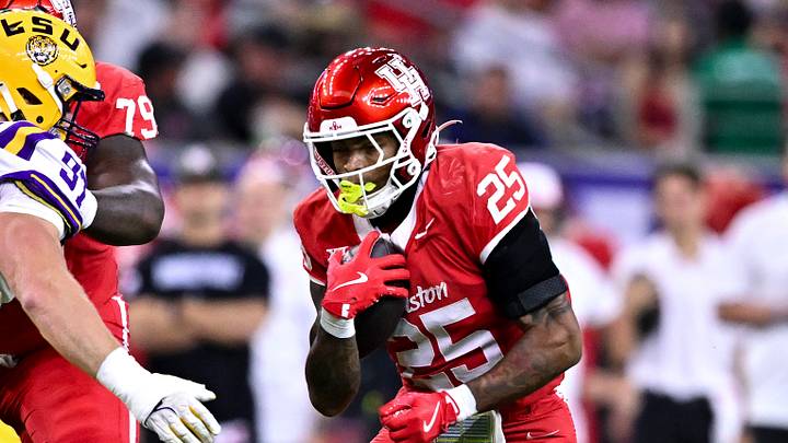 Dec 27, 2025; Houston, TX, USA; Houston Cougars running back DJ Butler (25) runs the ball during the first half against the Louisiana State Tigers at NRG Stadium. Mandatory Credit: Maria Lysaker-Imagn Images Dec 27, 2025; Houston, TX, USA; Houston Cougars running back DJ Butler (25) runs the ball during the first half against the Louisiana State Tigers at NRG Stadium. Mandatory Credit: Maria Lysaker-Imagn Images