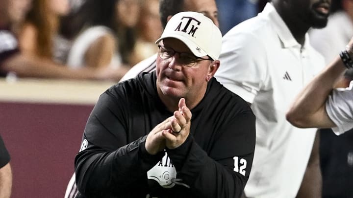 Texas A&M Aggies coach Mike Elko reacts after the win over the Florida Gators at Kyle Field. Texas A&M Aggies coach Mike Elko reacts after the win over the Florida Gators at Kyle Field.
