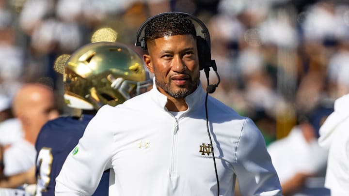 Oct 11, 2025; South Bend, Indiana, USA; Notre Dame Fighting Irish head coach Marcus Freeman looks to the scoreboard against the NC State Wolfpack during the first half at Notre Dame Stadium. Oct 11, 2025; South Bend, Indiana, USA; Notre Dame Fighting Irish head coach Marcus Freeman looks to the scoreboard against the NC State Wolfpack during the first half at Notre Dame Stadium.