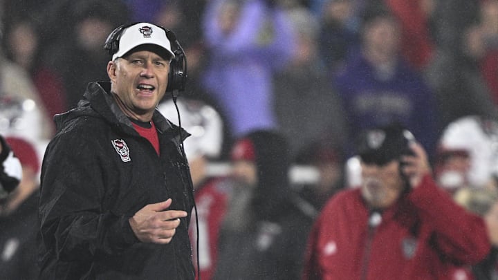 Dec 28, 2024; Annapolis, MD, USA; North Carolina State Wolfpack head coach Dave Doeren reacts after a play during the first half of the Go Bowling Military Bowl at Navy-Marine Corps Memorial Stadium. Mandatory Credit: Tommy Gilligan-Imagn Images Dec 28, 2024; Annapolis, MD, USA; North Carolina State Wolfpack head coach Dave Doeren reacts after a play during the first half of the Go Bowling Military Bowl at Navy-Marine Corps Memorial Stadium. Mandatory Credit: Tommy Gilligan-Imagn Images