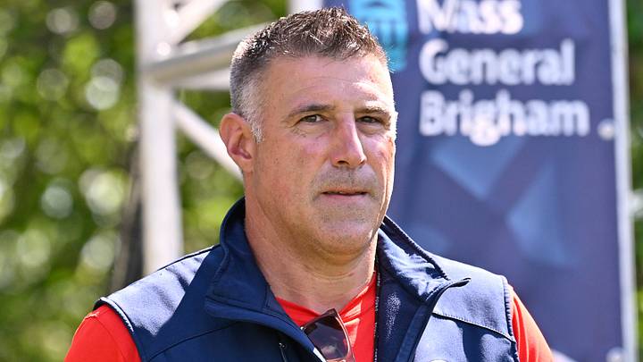 Jul 28, 2025; Foxborough, MA, USA; New England Patriots head coach Mike Vrabel heads to the practice fields for training camp at Gillette Stadium. Mandatory Credit: Eric Canha-Imagn Images
