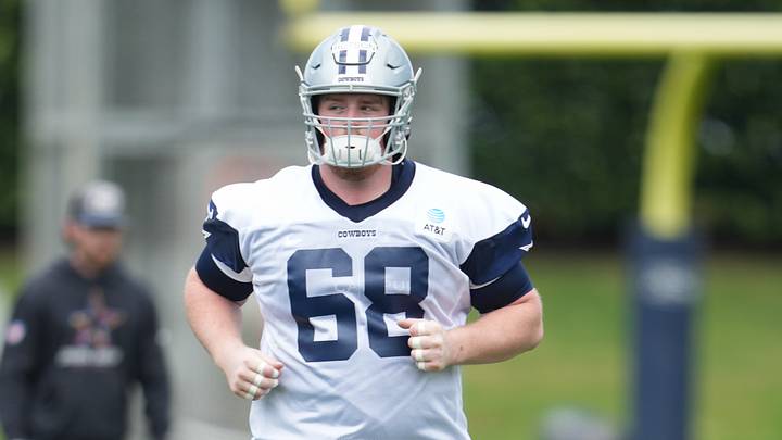 Dallas Cowboys offensive tackle Cole Hutson on the field during practice at the Ford Center at the Star Training Facility Dallas Cowboys offensive tackle Cole Hutson on the field during practice at the Ford Center at the Star Training Facility