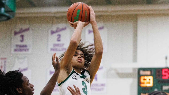 Washington's Steven Reynolds III (3) shoots the ball during a boys basketball game between Washington and Adams at Washington High School on Friday, Jan. 10, 2025, in South Bend.