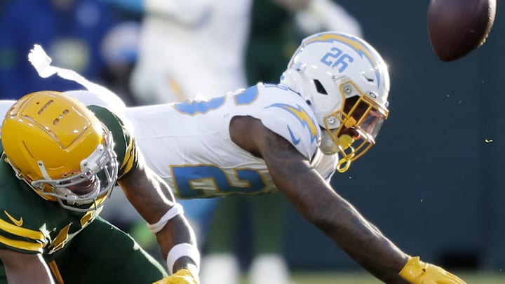 Los Angeles Chargers cornerback Asante Samuel Jr. (26) in called for pass interference on a throw to Packers receiver Dontayvion Wicks in 2023.
