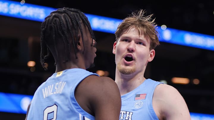 Dec 20, 2025; Atlanta, Georgia, USA; North Carolina Tar Heels forward Caleb Wilson (8) and center Henri Veesaar (13) celebrate after a basket against the Ohio State Buckeyes in the second half at State Farm Arena. Mandatory Credit: Brett Davis-Imagn Images
Dec 20, 2025; Atlanta, Georgia, USA; North Carolina Tar Heels forward Caleb Wilson (8) and center Henri Veesaar (13) celebrate after a basket against the Ohio State Buckeyes in the second half at State Farm Arena. Mandatory Credit: Brett Davis-Imagn Images