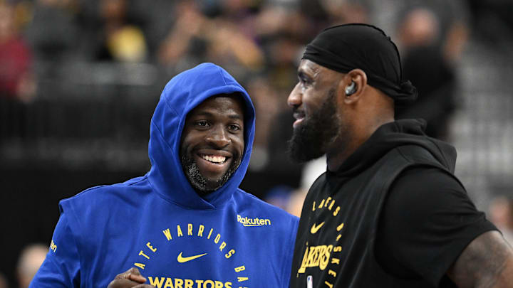 Oct 15, 2024; Las Vegas, Nevada, USA; Golden State Warriors forward Draymond Green (23) and Los Angeles Lakers forward LeBron James (23) talk on court before warm up at T-Mobile Arena. Mandatory Credit: Candice Ward-Imagn Images Oct 15, 2024; Las Vegas, Nevada, USA; Golden State Warriors forward Draymond Green (23) and Los Angeles Lakers forward LeBron James (23) talk on court before warm up at T-Mobile Arena. Mandatory Credit: Candice Ward-Imagn Images