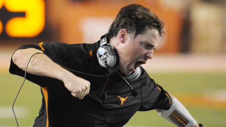 Texas Longhorns defensive coach Will Muschamp reacts to a call against the Wyoming Cowboys.