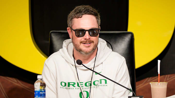 Oregon head coach Dan Lanning speaks from the podium at the Hatfield-Dowlin Complex on the first day of spring practice for the Oregon Ducks on March 12, 2026, in Eugene, Oregon.