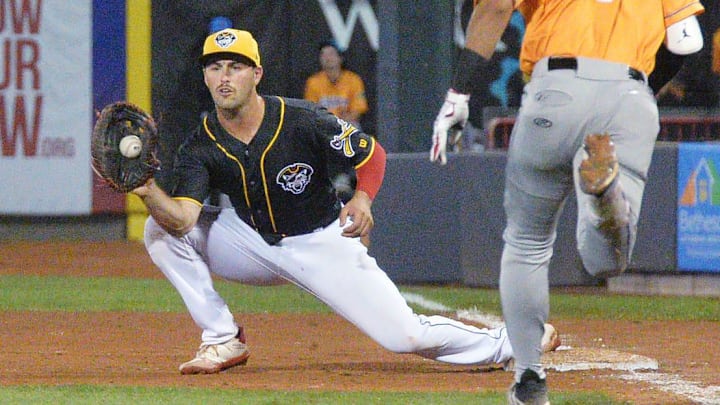 Erie SeaWolves first baseman Austin Murr, left, forces out Akron RubberDucks baserunner Yordys Valdes at UPMC Park in Erie on Sept. 19, 2024.