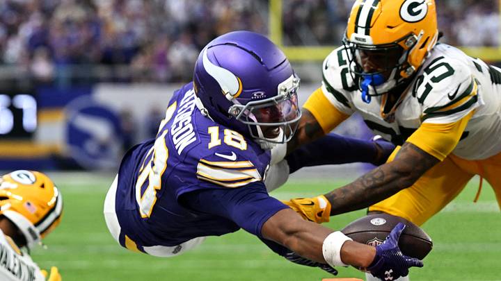 Minnesota Vikings wide receiver Justin Jefferson (18) reaches for a touchdown during the second half against Green Bay Packers cornerback Keisean Nixon (25) at U.S. Bank Stadium. Mandatory Credit: Jeffrey Becker-Imagn Images Minnesota Vikings wide receiver Justin Jefferson (18) reaches for a touchdown during the second half against Green Bay Packers cornerback Keisean Nixon (25) at U.S. Bank Stadium. Mandatory Credit: Jeffrey Becker-Imagn Images