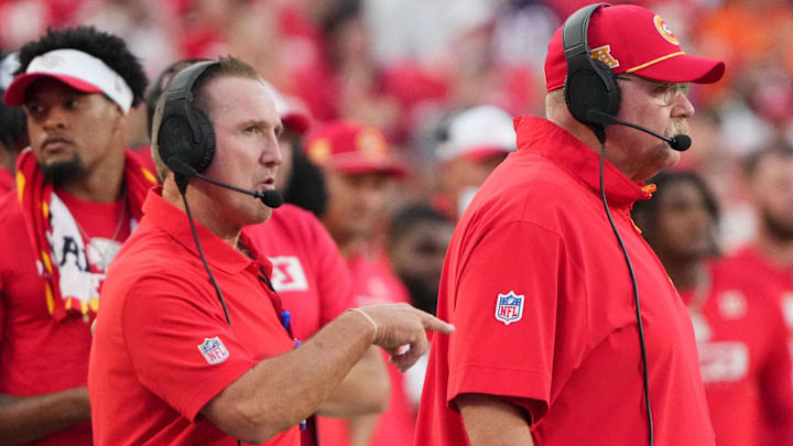 Aug 22, 2024; Kansas City, Missouri, USA; Kansas City Chiefs defensive coordinator Steve Spagnuolo, left and head coach Andy Reid watch play against the Chicago Bears during the game at GEHA Field at Arrowhead Stadium. Mandatory Credit: Denny Medley-Imagn Images