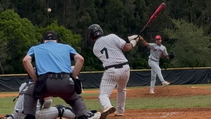 West Broward first baseman Reggie Rodriguez comes through with an RBI single in Game 3 against Columbus in the Class 7A Region 4 Semifinals.