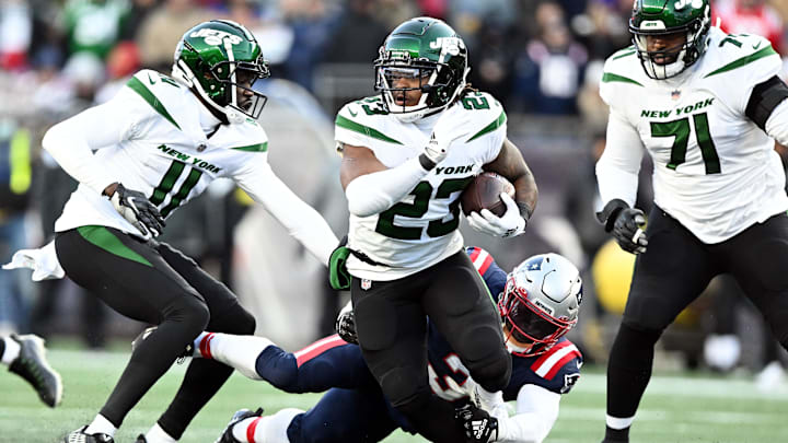 Nov 20, 2022; Foxborough, Massachusetts, USA; New York Jets running back James Robinson (23) breaks