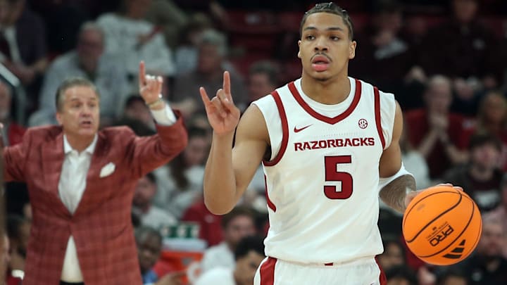 Arkansas Razorbacks guard Darius Acuff Jr. (5) dribbles during the first half against the Mississippi State Bulldogs at Humphrey Coliseum. 