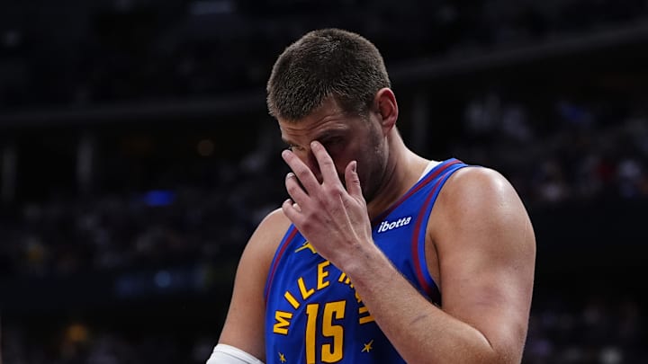 May 9, 2025; Denver, Colorado, USA; Denver Nuggets center Nikola Jokic (15) reacts after a shooting foul is called in the second quarter against the Oklahoma City Thunder during game three of the second round for the 2025 NBA Playoffs at Ball Arena. Mandatory Credit: Ron Chenoy-Imagn Images
