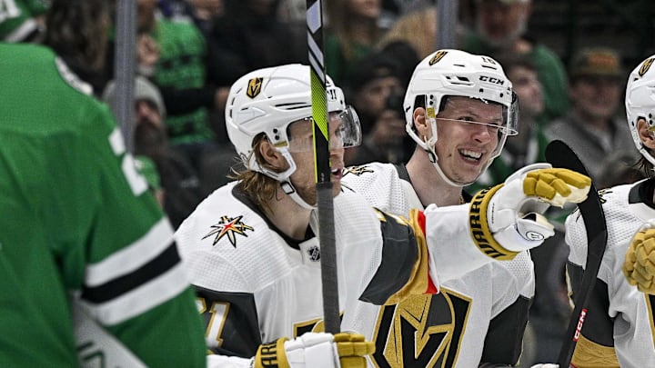 Dec 9, 2023; Dallas, Texas, USA; Vegas Golden Knights center William Karlsson (71) and left wing Pavel Dorofeyev (16) and defenseman Zach Whitecloud (2) and defenseman Nicolas Hague (14) celebrate a goal scored by Dorofeyev against Dallas Stars goaltender Jake Oettinger (29) during the third period at the American Airlines Center. Mandatory Credit: Jerome Miron-Imagn Images