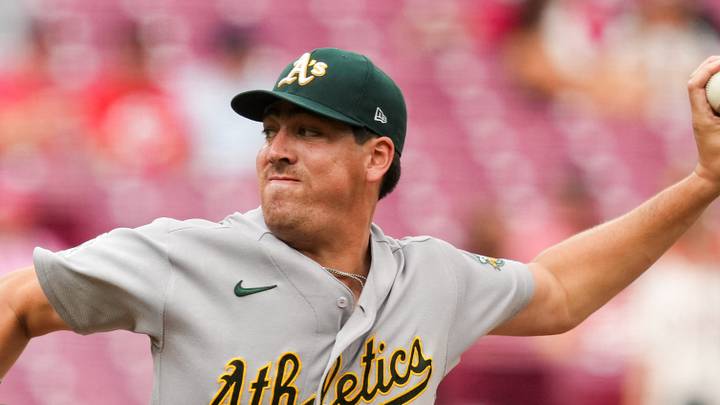 Aug 5, 2026; Cincinnati, Ohio, USA;  Athletics' pitcher Jacob Lopez (57) throws against the Cincinnati Reds in the second inning at Great American Ball Park. Mandatory Credit: Aaron Doster-Imagn Images