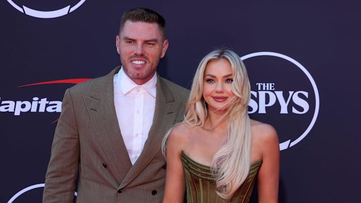 Los Angeles Dodgers first baseman Freddie Freeman (left) and wife Chelsea