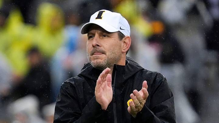 Iowa offensive coordinator Tim Lester watches warm ups Nov. 8, 2025 before a Big Ten Football game against the Oregon Ducks at Kinnick Stadium in Iowa City, Iowa. Iowa offensive coordinator Tim Lester watches warm ups Nov. 8, 2025 before a Big Ten Football game against the Oregon Ducks at Kinnick Stadium in Iowa City, Iowa.