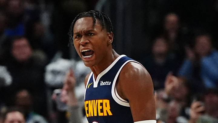 Nov 6, 2024; Denver, Colorado, USA; Denver Nuggets forward Peyton Watson (8) reacts in the fourth quarter against the Oklahoma City Thunder at Ball Arena. Mandatory Credit: Ron Chenoy-Imagn Images