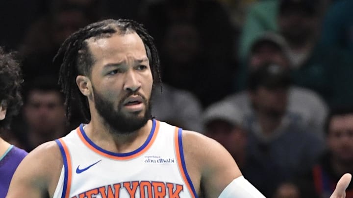New York Knicks guard Jalen Brunson complains about a possible foul during the second half against the Charlotte Hornets. New York Knicks guard Jalen Brunson complains about a possible foul during the second half against the Charlotte Hornets.