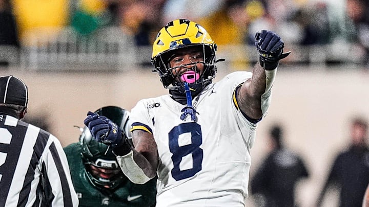 Michigan edge Derrick Moore Michigan edge Derrick Moore