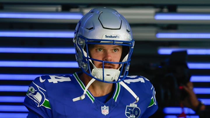 Oct 5, 2025; Seattle, Washington, USA; Seattle Seahawks quarterback Sam Darnold (14) takes the field prior to a game against the Tampa Bay Buccaneers at Lumen Field. Mandatory Credit: Joe Nicholson-Imagn Images