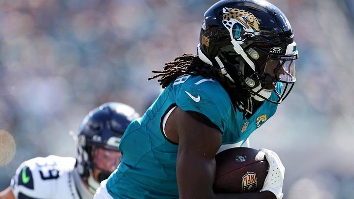 Oct 12, 2025; Jacksonville, Florida, USA; Jacksonville Jaguars wide receiver Brian Thomas Jr. (7) scores a touchdown that is called back for a flag during the second half against the Seattle Seahawks at EverBank Stadium. Mandatory Credit: Morgan Tencza-Imagn Images