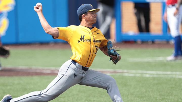 West Virginia Mountaineers junior Dawson Montesa (31) pitches against Kansas Jayhawks during the game inside Hoglund Ballpark on May 10, 2026. West Virginia Mountaineers junior Dawson Montesa (31) pitches against Kansas Jayhawks during the game inside Hoglund Ballpark on May 10, 2026.