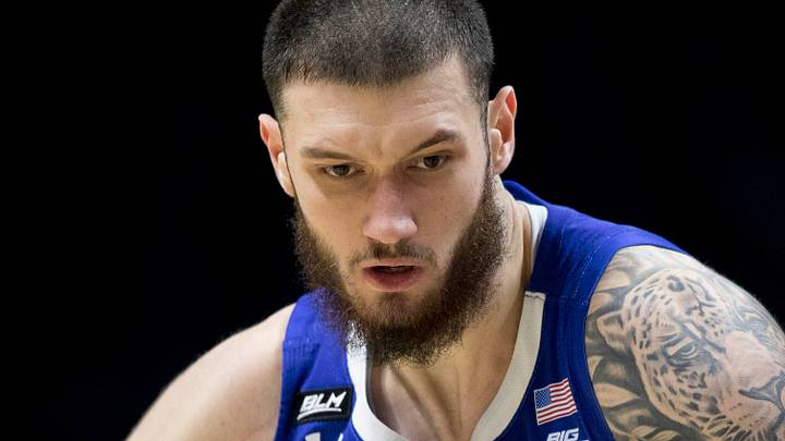 Seton Hall Pirates forward Sandro Mamukelashvili (23) drives on Xavier Musketeers forward Jason Carter (25) in the second half of the NCAA men's basketball game on Wednesday, Dec. 30, 2020 at Xavier University in Cincinnati. Seton Hall Pirates defeated Xavier Musketeers 85-68.

Seton Hall Pirates Xavier Musketeers 54