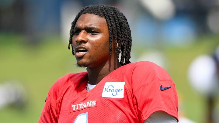 Aug 4, 2026; Nashville, TN, USA; Tennessee Titans quarterback Cam Ward stretches during training camp Aug 4, 2026; Nashville, TN, USA; Tennessee Titans quarterback Cam Ward stretches during training camp