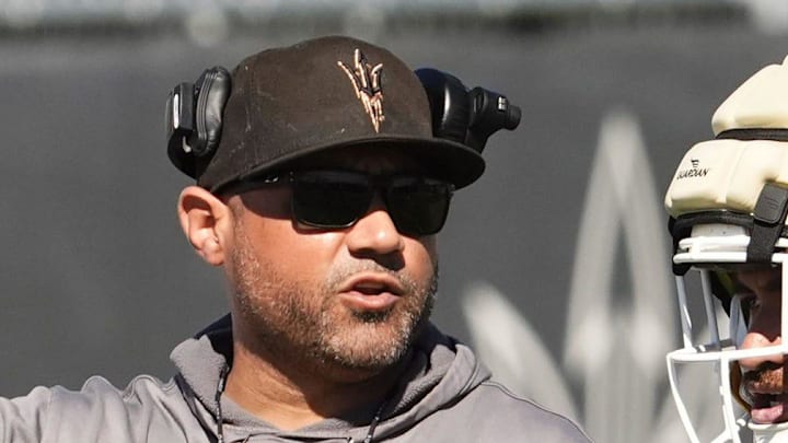 Arizona State linebackers coach A.J. Cooper talks to linebacker Zyrus Fiaseu (30) during practice on March 24, 2026, at Kajikawa Practice Fields in Tempe. Arizona State linebackers coach A.J. Cooper talks to linebacker Zyrus Fiaseu (30) during practice on March 24, 2026, at Kajikawa Practice Fields in Tempe.