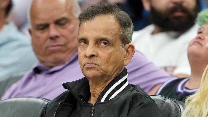 Apr 5, 2026; Sacramento, California, USA; Sacramento Kings chairman Vivek Ranadive (center) sits courtside during the second quarter against the LA Clippers at Golden 1 Center. Mandatory Credit: Darren Yamashita-Imagn Images