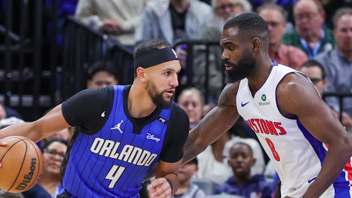 Orlando Magic guard Jalen Suggs drives to the basket against Detroit Pistons forward Tim Hardaway Jr. Orlando Magic guard Jalen Suggs drives to the basket against Detroit Pistons forward Tim Hardaway Jr.