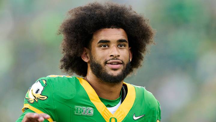Sep 18, 2026; Eugene, Oregon, USA; Oregon Ducks quarterback Dante Moore (5) waves to a fan before a game against the Portland State Vikings at Autzen Stadium. Mandatory Credit: Troy Wayrynen-Imagn Images Sep 18, 2026; Eugene, Oregon, USA; Oregon Ducks quarterback Dante Moore (5) waves to a fan before a game against the Portland State Vikings at Autzen Stadium. Mandatory Credit: Troy Wayrynen-Imagn Images