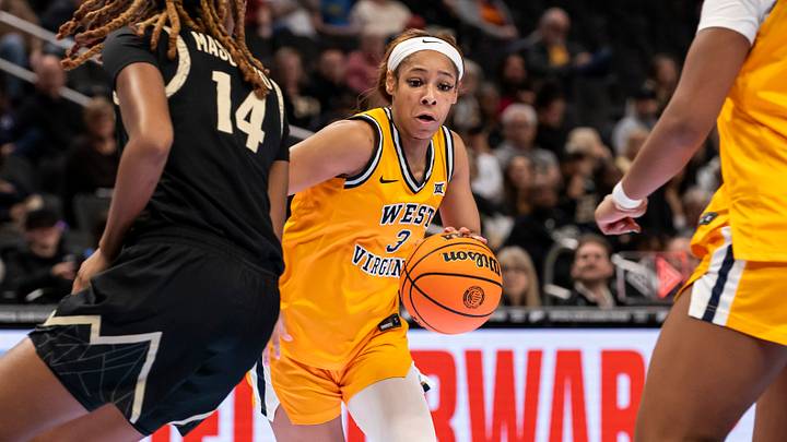 Mar 7, 2026; Kansas City, MO, USA; West Virginia Mountaineers guard Gia Cooke (3) looks for an opening against the Colorado Buffaloes during the second half at T-Mobile Center. Mandatory Credit: Nick Tre. Smith-Imagn Images Mar 7, 2026; Kansas City, MO, USA; West Virginia Mountaineers guard Gia Cooke (3) looks for an opening against the Colorado Buffaloes during the second half at T-Mobile Center. Mandatory Credit: Nick Tre. Smith-Imagn Images