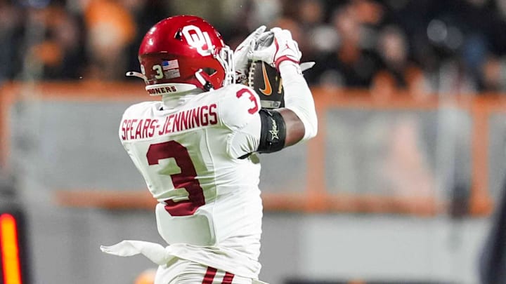 Oklahoma defensive back Robert Spears-Jennings (3) catches an interception at Tennessee, one of three OU takeaways.