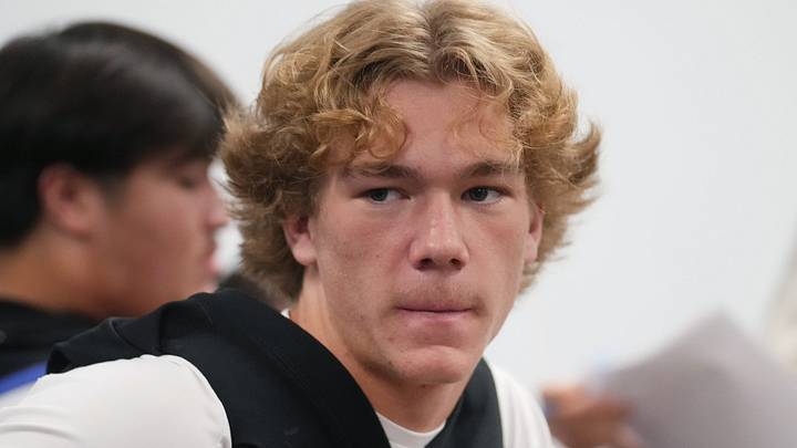 Chandler Wolves quarterback Will Mencl sits with his teammates during the high school football Championships Media Day at the Arizona Interscholastic Association office in Phoenix on Dec. 1, 2025. Chandler Wolves quarterback Will Mencl sits with his teammates during the high school football Championships Media Day at the Arizona Interscholastic Association office in Phoenix on Dec. 1, 2025.