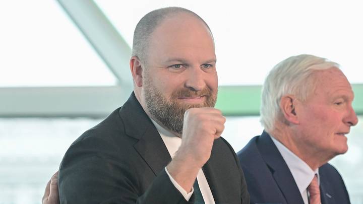 May 6, 2026; Milwaukee, WI, USA;  Milwaukee Bucks general manager Jon Horst (left) and co-owner Jimmy Haslam (right) introduce new head coach Taylor Jenkins (center) at a press conference at Milwaukee Art Museum. Mandatory Credit: Benny Sieu-Imagn Images