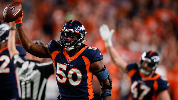 Sep 25, 2022; Denver, Colorado, USA; Denver Broncos linebacker Jonas Griffith (50) celebrates after an interception in the fourth quarter against the San Francisco 49ers at Empower Field at Mile High. Sep 25, 2022; Denver, Colorado, USA; Denver Broncos linebacker Jonas Griffith (50) celebrates after an interception in the fourth quarter against the San Francisco 49ers at Empower Field at Mile High.