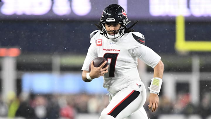 Jan 18, 2026; Foxborough, MA, USA; Houston Texans quarterback C.J. Stroud (7) runs with the ball in the third quarter against the New England Patriots in an AFC Divisional Round game at Gillette Stadium. Mandatory Credit: Brian Fluharty-Imagn Images