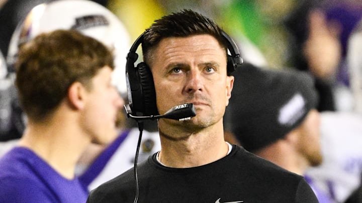 Dec 20, 2025; Eugene, OR, USA; James Madison Dukes head coach Bob Chesney looks on during the second quarter against the Oregon Ducks at Autzen Stadium. Mandatory Credit: Troy Wayrynen-Imagn Images