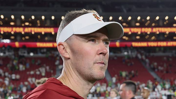 Sep 26, 2026; Los Angeles, California, USA; USC Trojans head coach Lincoln Riley walks off the field after the game against the Oregon Ducks at United Airlines Field at Los Angeles Memorial Coliseum. Mandatory Credit: Kiyoshi Mio-Imagn Images Sep 26, 2026; Los Angeles, California, USA; USC Trojans head coach Lincoln Riley walks off the field after the game against the Oregon Ducks at United Airlines Field at Los Angeles Memorial Coliseum. Mandatory Credit: Kiyoshi Mio-Imagn Images
