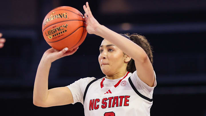 Mar 6, 2026; Duluth, GA, USA; North Carolina State Wolfpack guard Devyn Quigley (0) shoots against the Notre Dame Fighting Irish in the fourth quarter at Gas South Arena. Mandatory Credit: Brett Davis-Imagn Images Mar 6, 2026; Duluth, GA, USA; North Carolina State Wolfpack guard Devyn Quigley (0) shoots against the Notre Dame Fighting Irish in the fourth quarter at Gas South Arena. Mandatory Credit: Brett Davis-Imagn Images