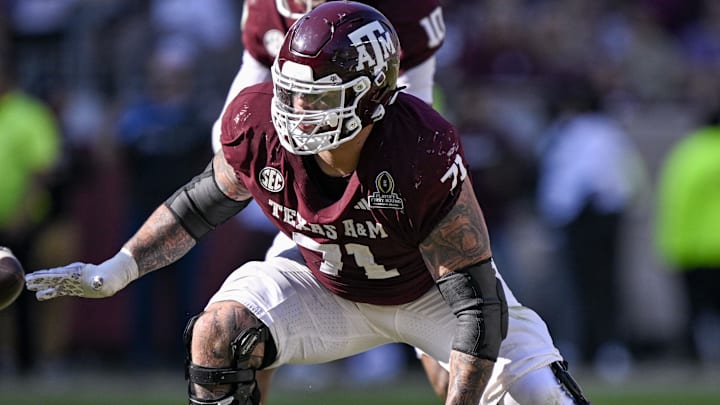 Texas A&M Aggies OG Chase Bisontis blocks the rush during the game between the Aggies and the Hurricanes. Texas A&M Aggies OG Chase Bisontis blocks the rush during the game between the Aggies and the Hurricanes.