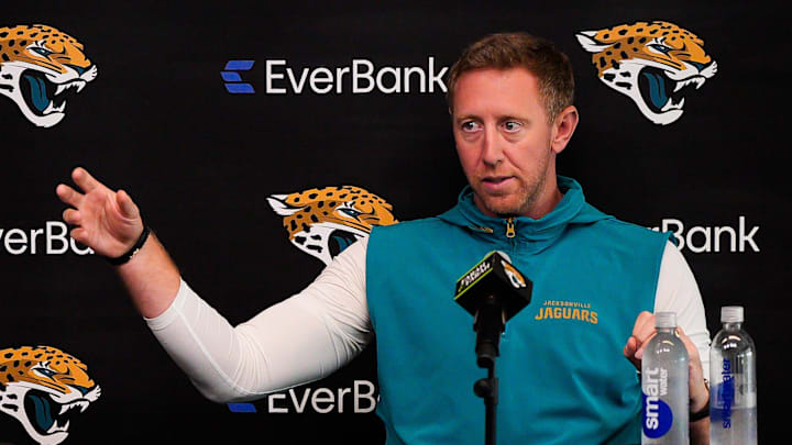 Jaguars General Manager James Gladstone, left listens as head coach Liam Coen talked about Trevon Walker during the Jacksonville Jaguars’ annual pre-draft luncheon press conference in the media room at the Miller Electric Center Thursday April 9, 2026 in Jacksonville, Fla. [Doug Engle/Florida Times-Union]